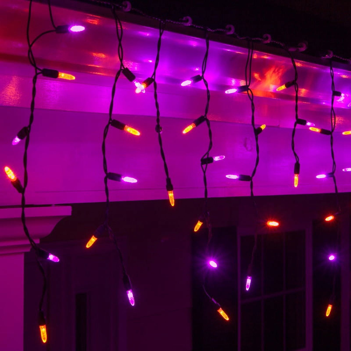 Wintergreen Lighting Halloween Mini LED Icicle Lights on Halloween Hanging Lights LED, Purple and Orange Lights on Black Wire, Fun House Halloween Decorations (70 Icicle Lights)